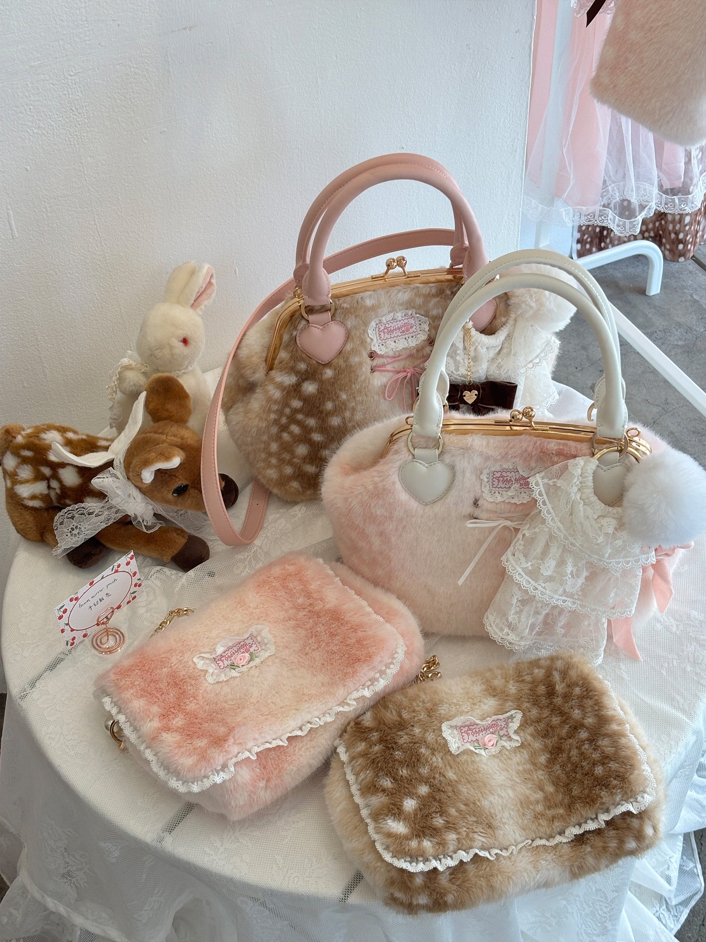 lace pompom logo charm