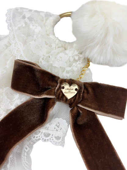 lace pompom logo charm